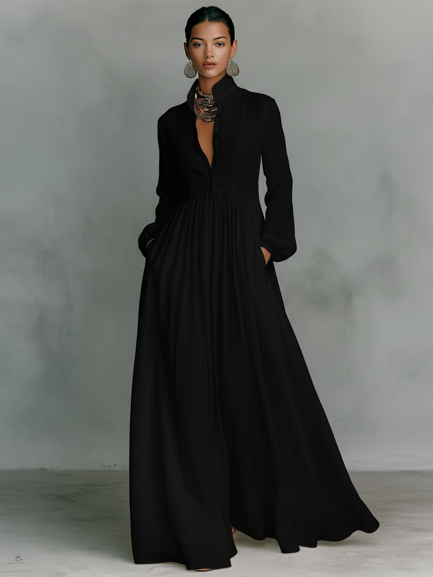 Black cotton-linen maxi shirt dress with V-neck, button front, long sleeves and full skirt