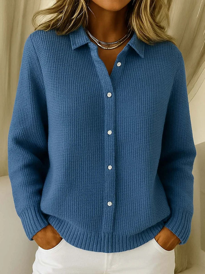 Blue knit cardigan sweater with point collar, button-front, long sleeves, ribbed hem