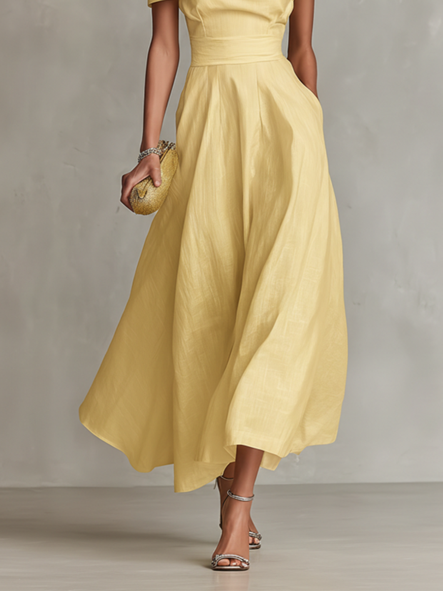 Women's yellow one-shoulder linen dress with pleated flared hem and midi length