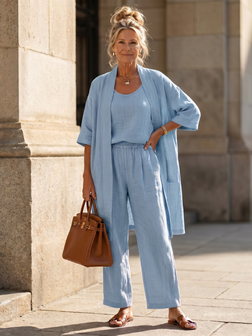 Blue relaxed top and wide-leg pants set with open kimono-style layer