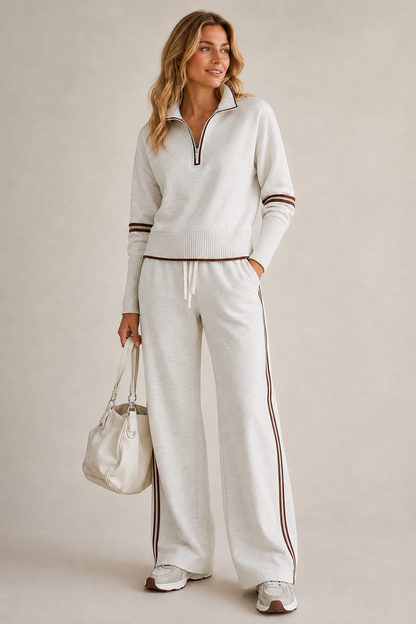 Women’s two-piece quarter-zip knit set, light gray top with striped wide-leg joggers