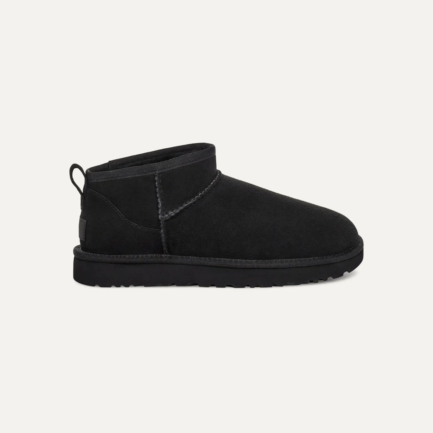 Black suede ultra mini boots with ankle pull tab and rounded toe