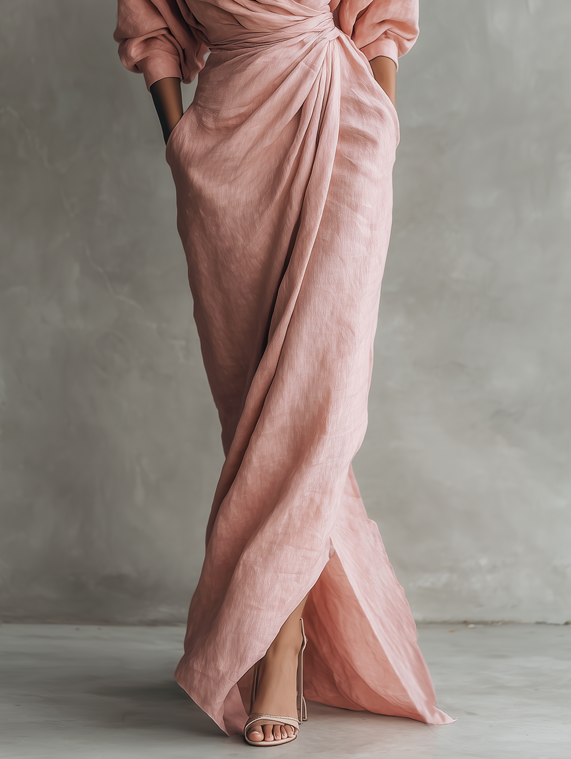 Pink linen-blend maxi dress with draped waist knot and high side slit, full-length skirt
