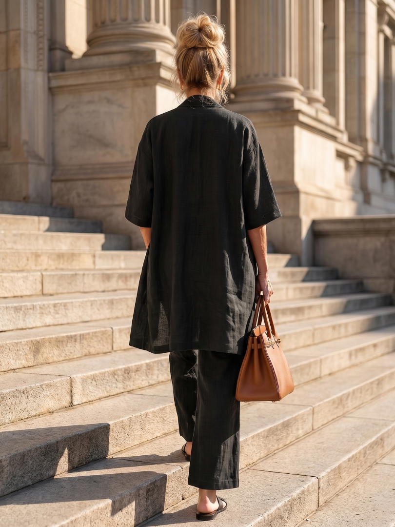 Yael black relaxed top and pant set shown from back with cover-up