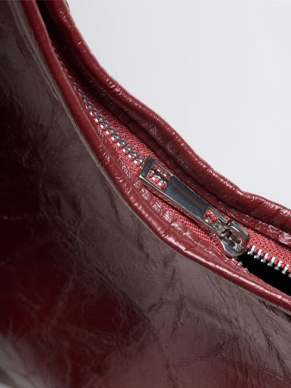 Red distressed vegan leather tote zipper detail and stitched trim
