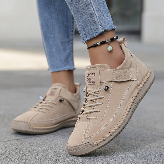 Beige slip-on trainers with lace-up front and hook-and-loop ankle strap