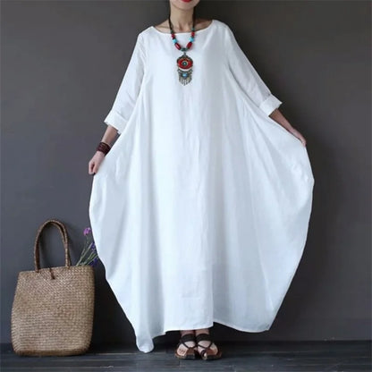 Loose-fit kaftan maxi dress in white, round neckline, elbow-length sleeves