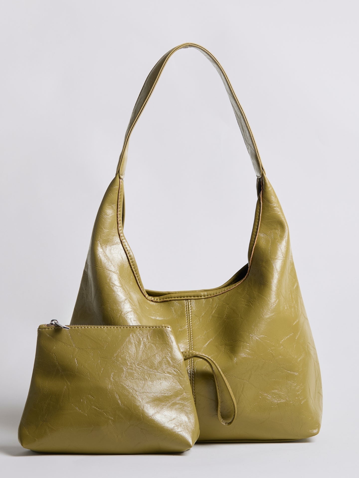Distressed vegan leather tote bag in olive green with matching zip pouch pocket