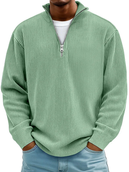 Green quarter-zip pullover sweater with ribbed knit and vertical stripe texture