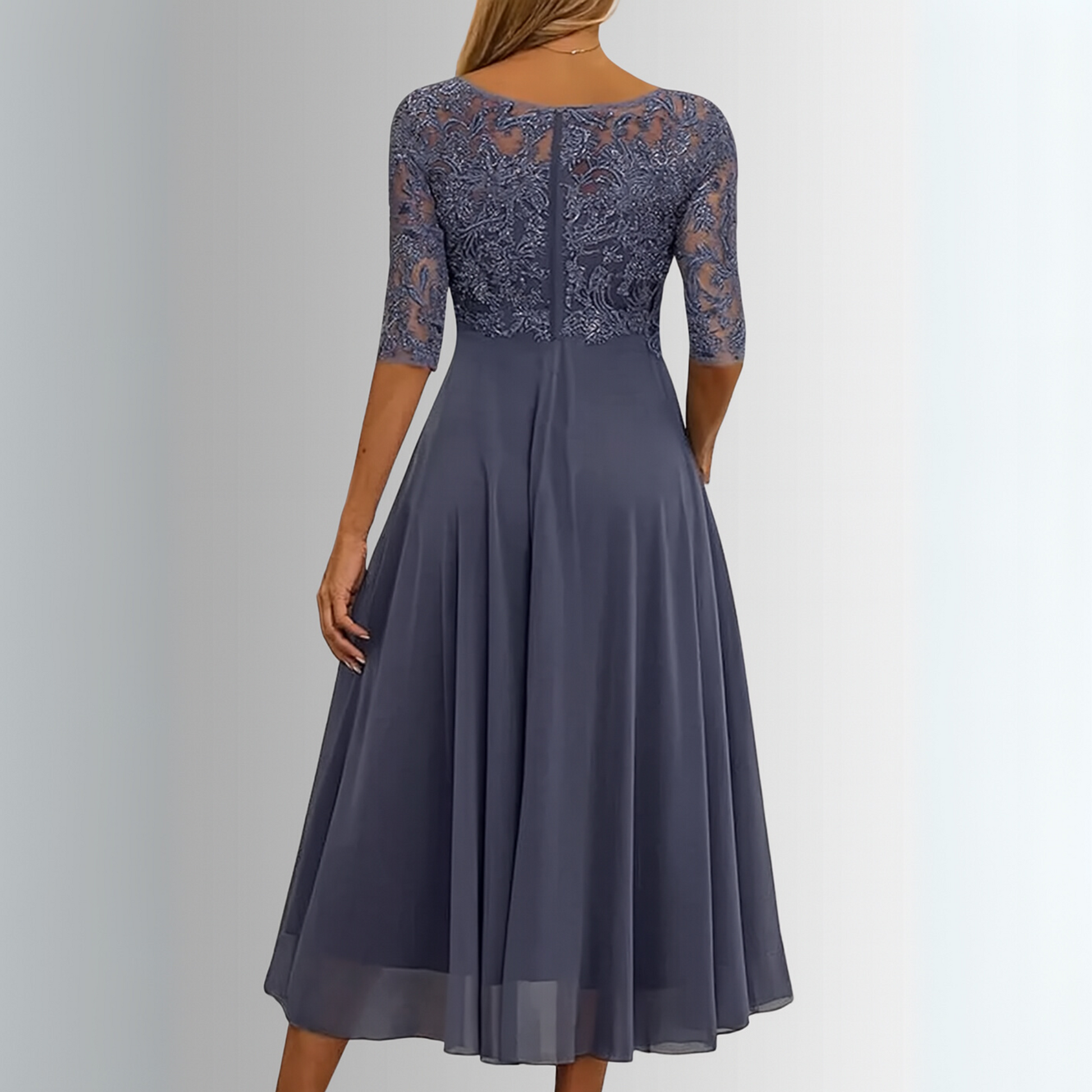 Navy lace midi dress with lace back, 3/4 sleeves, and pleated skirt