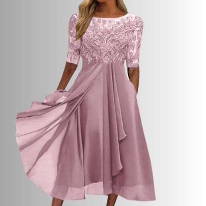 Pink lace midi dress with 3/4 sleeves, lace yoke, and layered pleated skirt