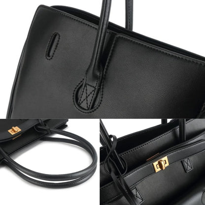 Black handbag close-up: smooth panels, strap details, and gold-tone hardware accents