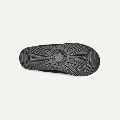 Black rubber outsole for suede slip-on slippers with geometric traction tread