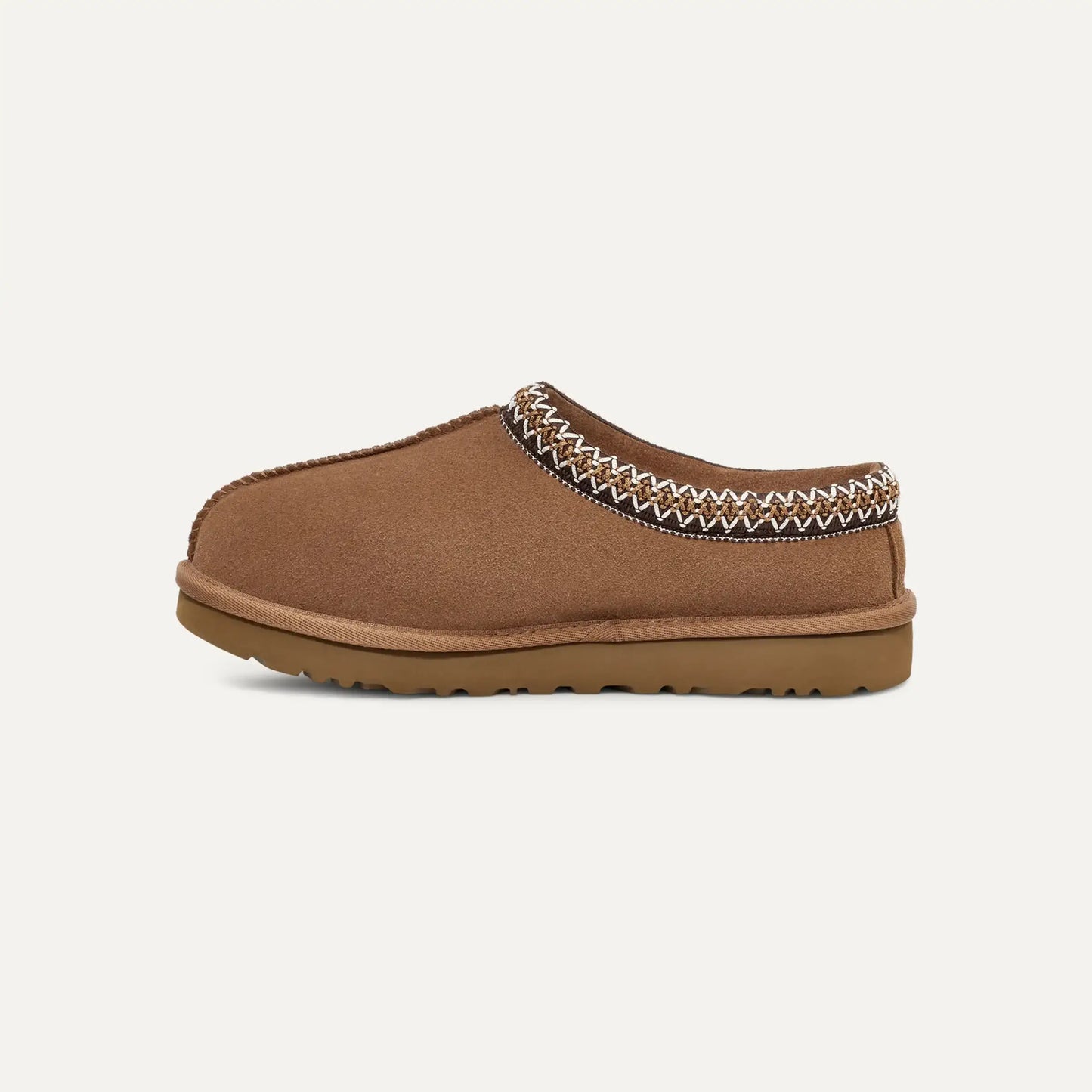 Chestnut brown suede slipper with stitched moc-style collar and rubber outsole