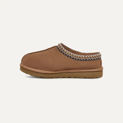 Chestnut brown suede slipper with stitched moc-style collar and rubber outsole