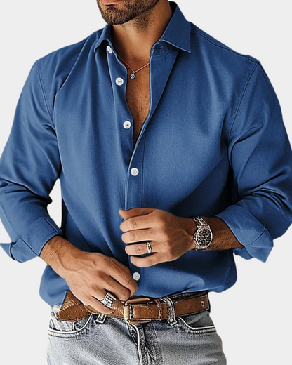 Blue long-sleeve button-up shirt with pointed collar and button front