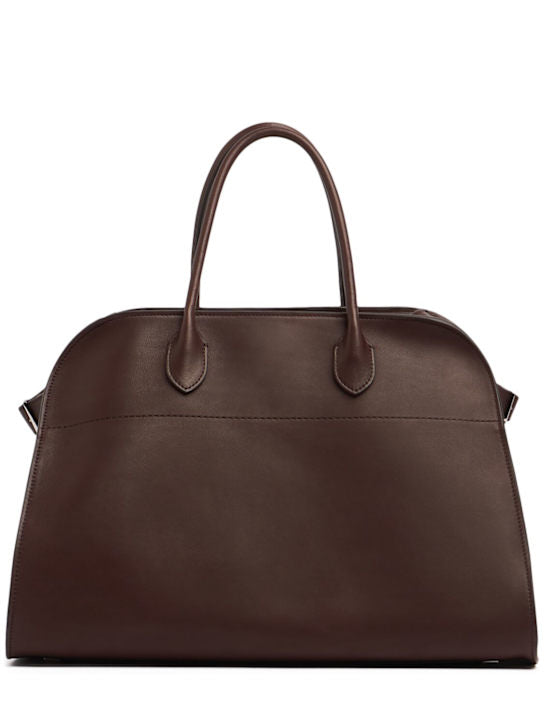 Brown suede tote handbag with two top handles and side strap details