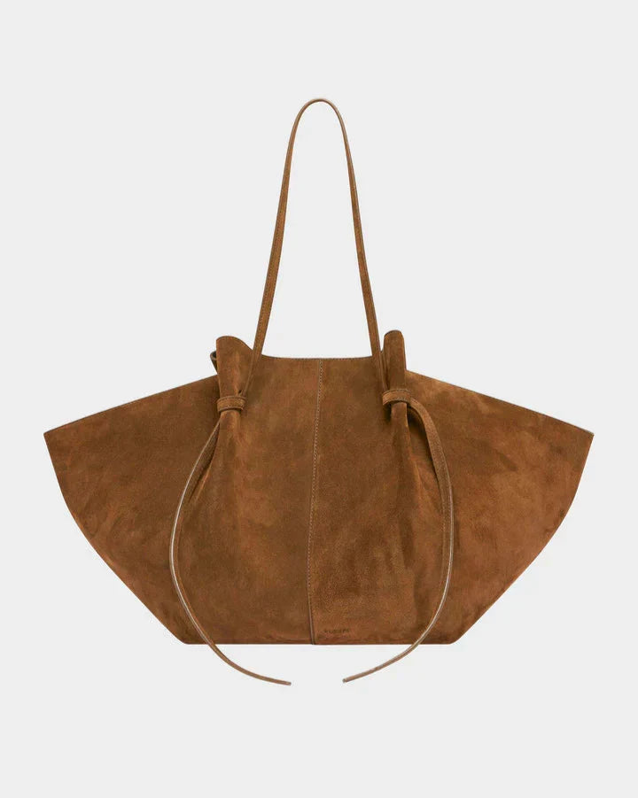 Brown suede tote bag with long handles and drawstring top