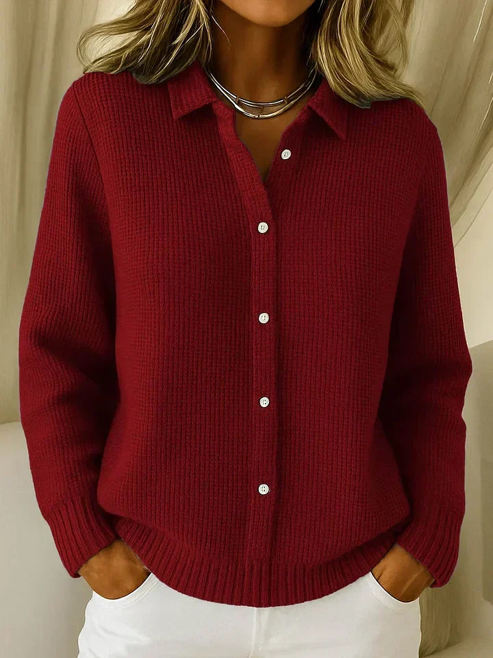 Dark red knit cardigan sweater with point collar, button-front, long sleeves, ribbed hem