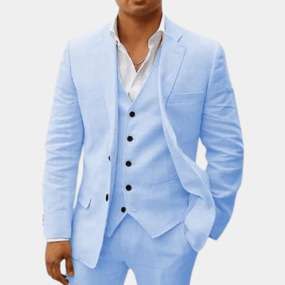 Light blue linen blazer, vest, and trousers set with notch lapels and pocket square