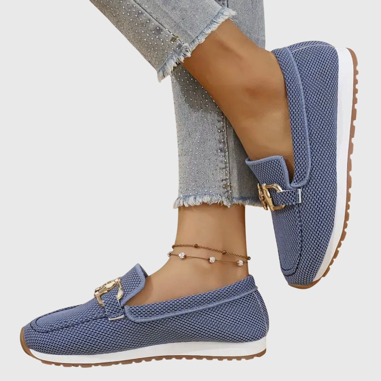 Blue orthopedic mesh loafers with gold buckle strap and rubber outsole