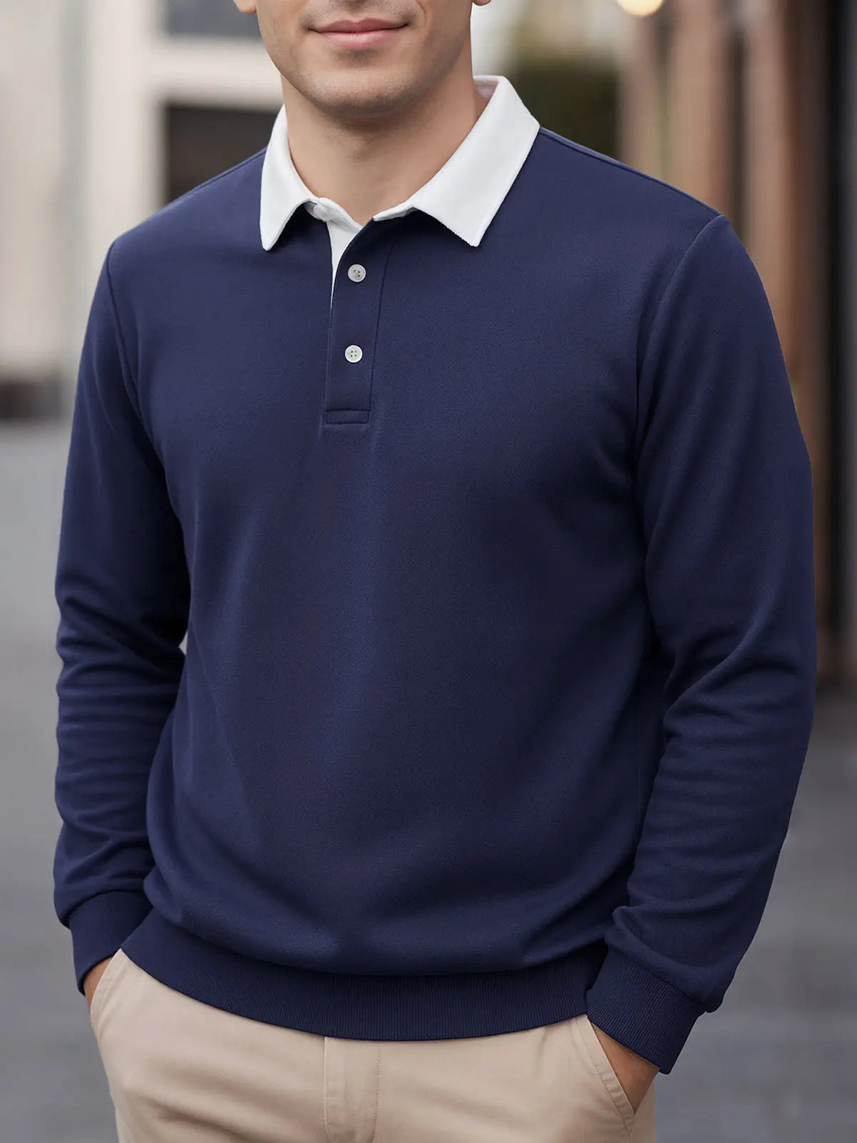 Navy long-sleeve polo sweatshirt with white collar and button placket