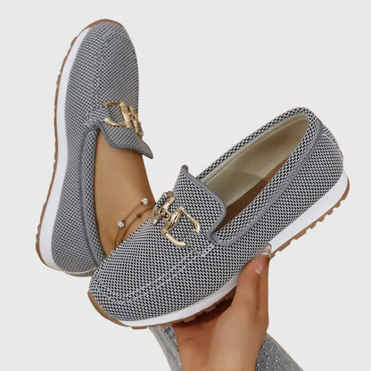 Gray orthopedic loafers with gold buckle bit; open angle shows beige lining