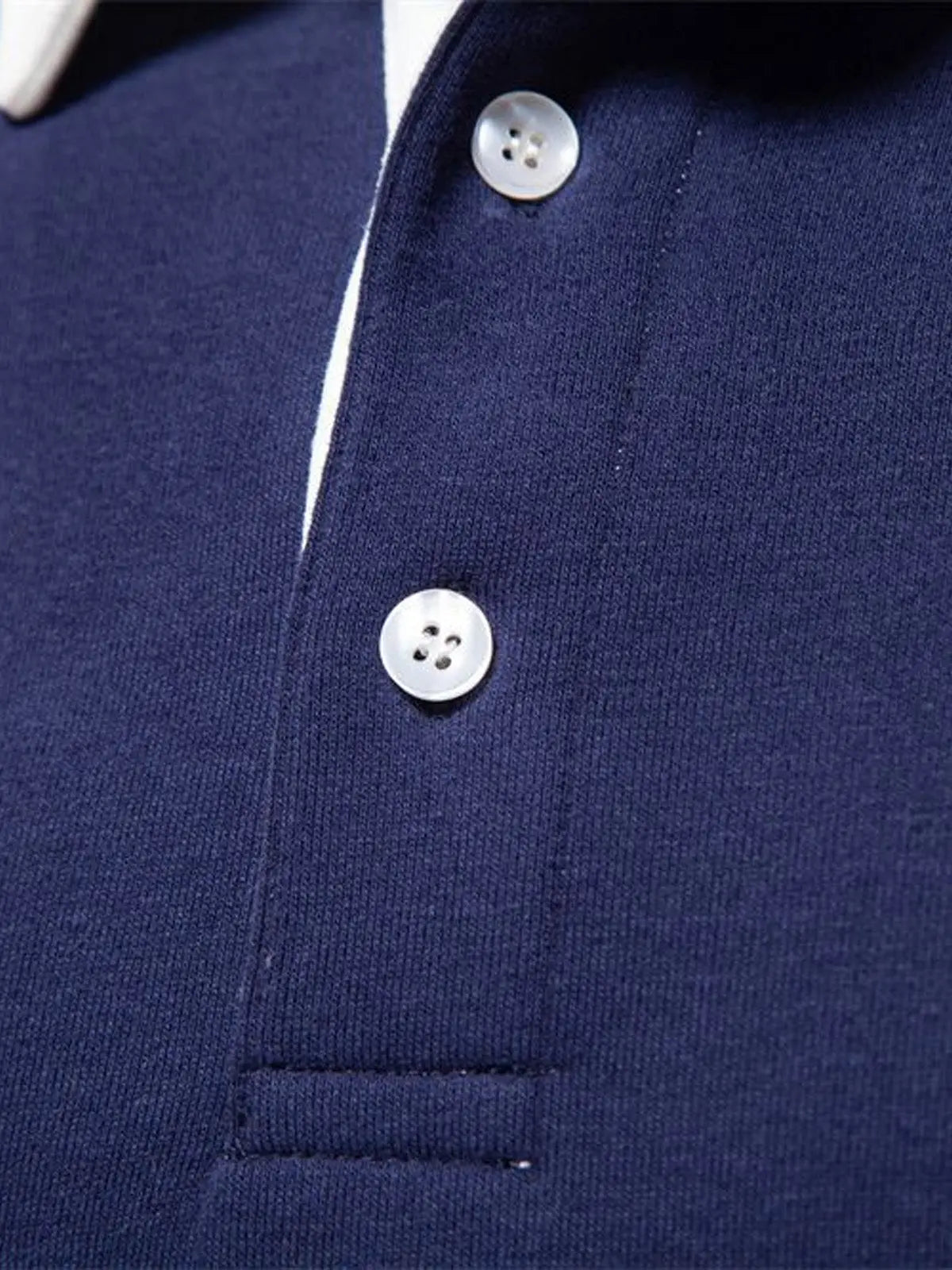 Navy polo sweatshirt chest detail with two-button placket and ribbed trim