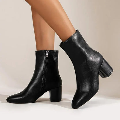 Women’s black ankle boots with mid block heel and side zipper
