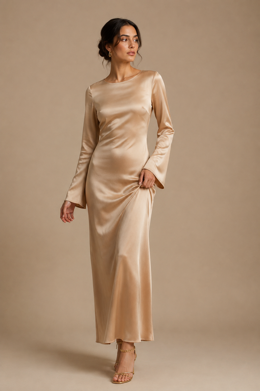 Champagne satin maxi dress with long sleeves and gathered waist ruching