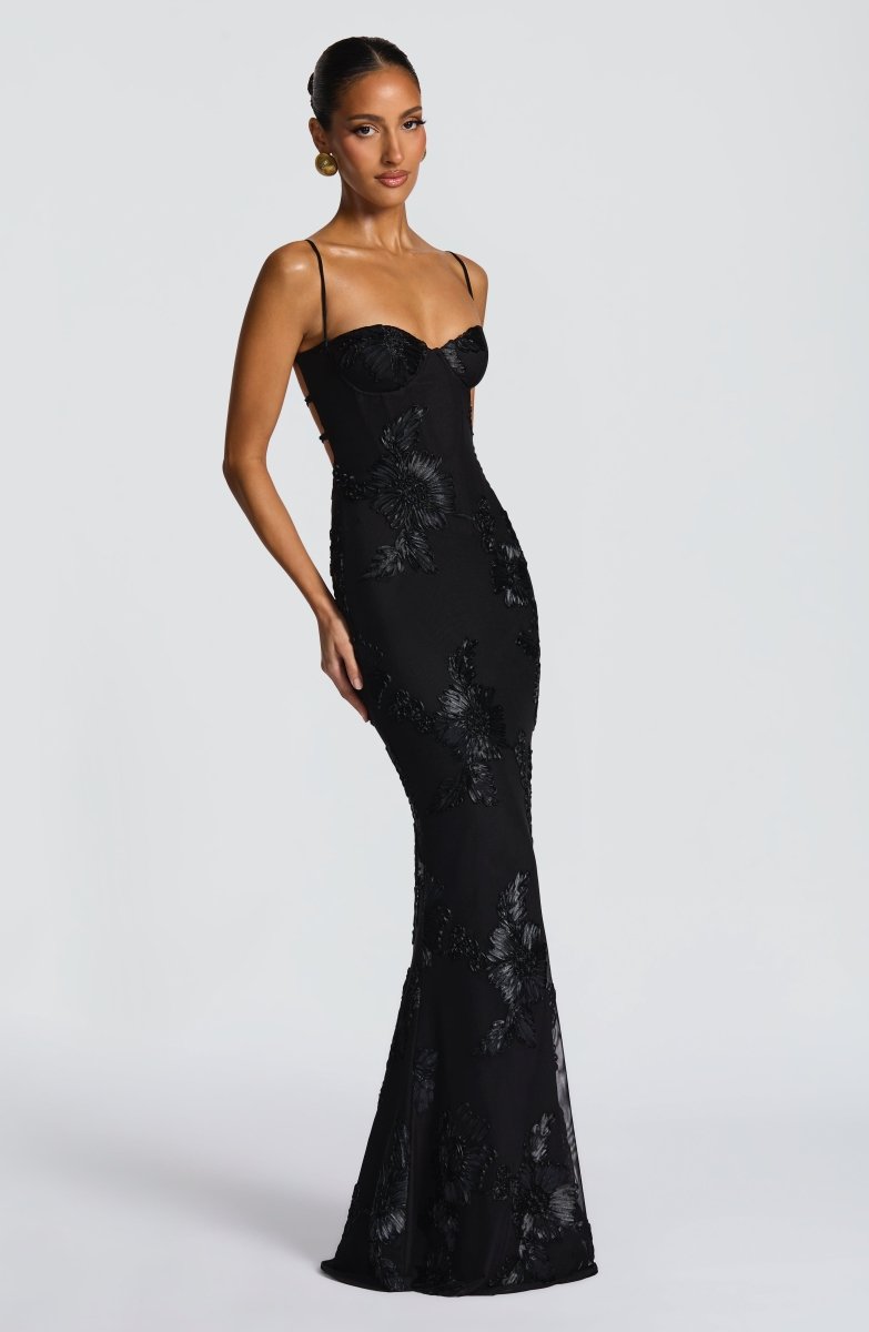 Black strapless lace maxi dress with fitted bodice and long mermaid skirt.