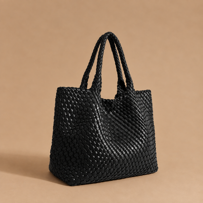 Womens woven tote bag with top handles, black woven texture.