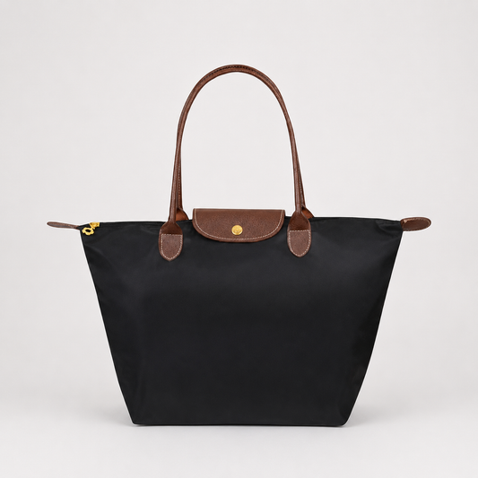 Structured shoulder tote bag with top handles, front flap, and gold clasp, dark black