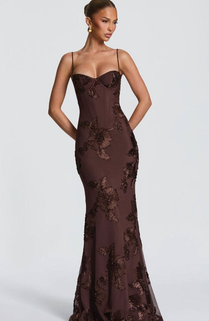 Burgundy lace maxi dress with spaghetti straps and fitted V-neck bodice.