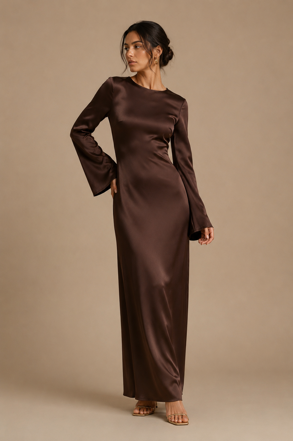 Brown satin maxi dress with long sleeves and fitted straight silhouette