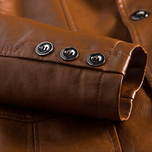 Cognac brown leather jacket sleeve cuff close-up with four metal buttons