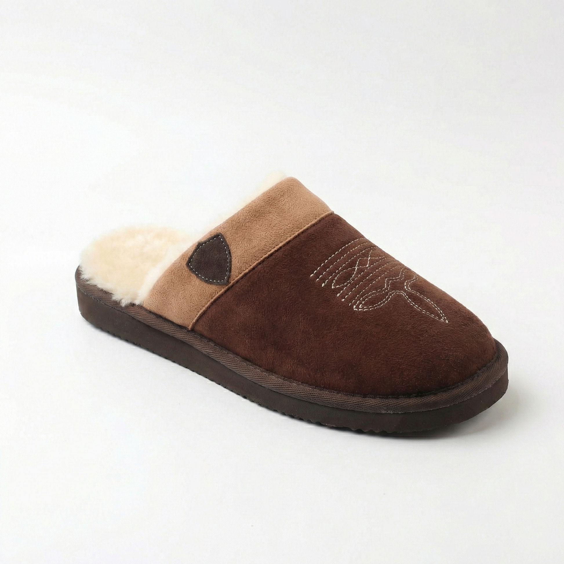 Cowboy slippers in tan/brown suede with white faux-fur lining and stitched cowboy detail.