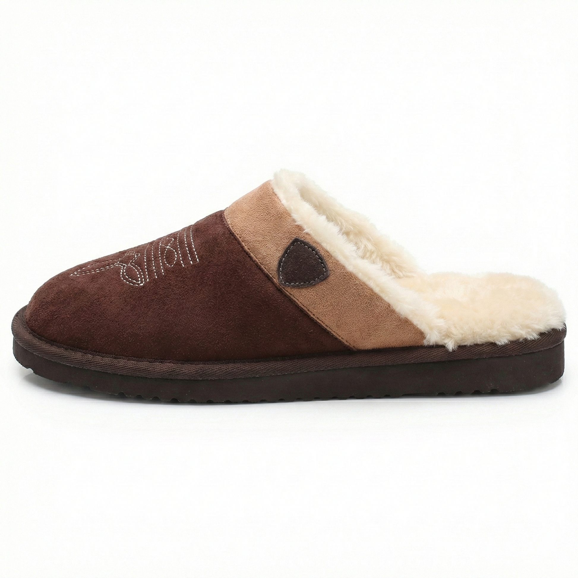 Cowboy slippers in dark brown suede with tan strap panel, plush white lining, cushioned sole.