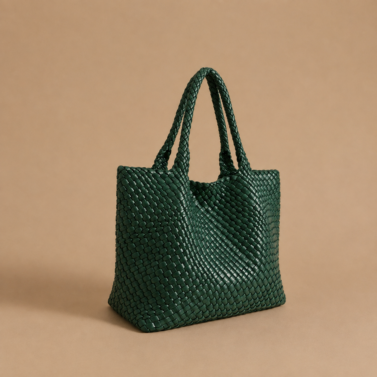 Womens woven tote bag with top handles, forest green woven texture.