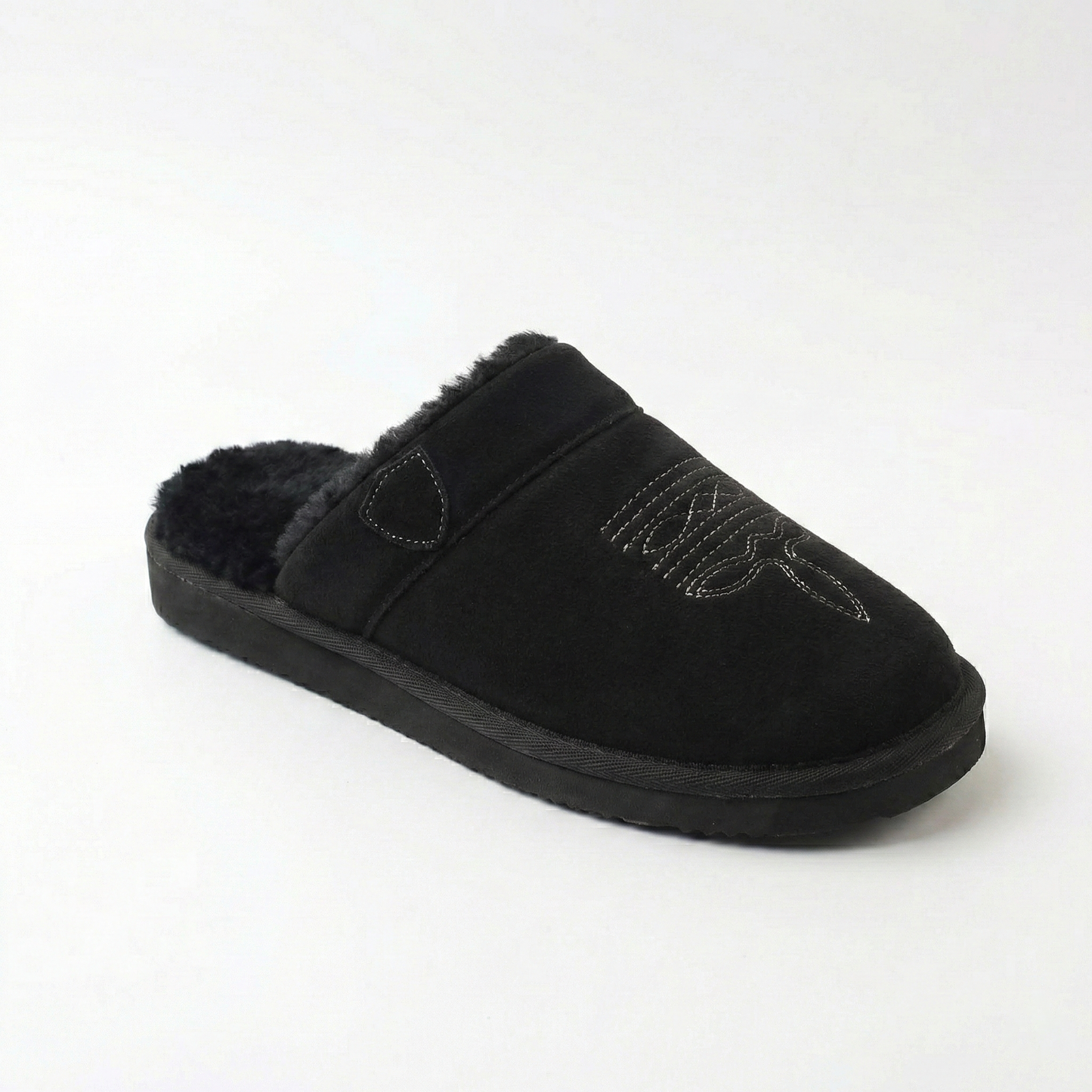 Cowboy slippers in black suede with faux-fur lining, stitched cowboy motif, and thick sole.