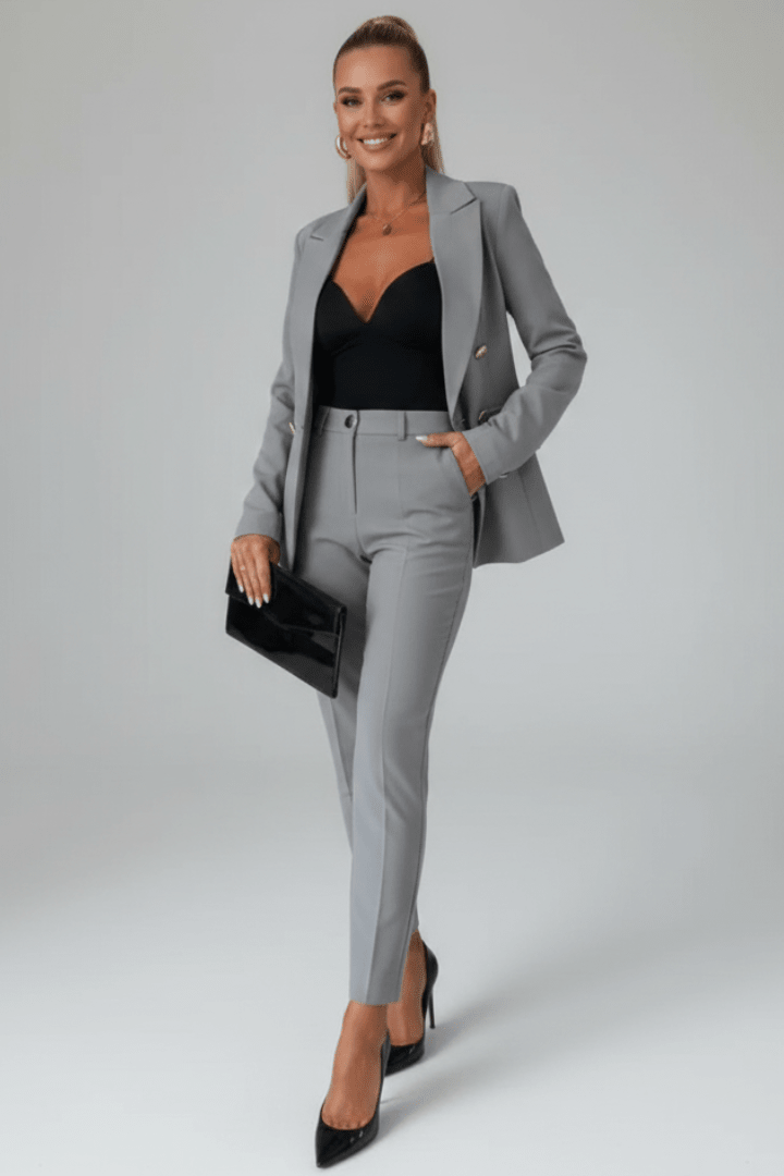 Gray blazer and matching trousers suit with notched lapels and pocket detail