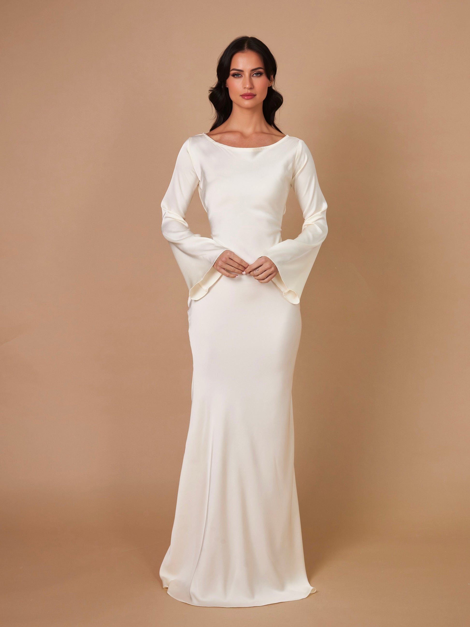 Cream long-sleeve maxi dress with round neckline and fitted skirt