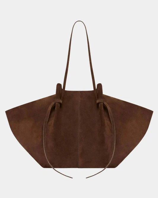 Brown suede tote bag with long handles and gathered drawstring opening