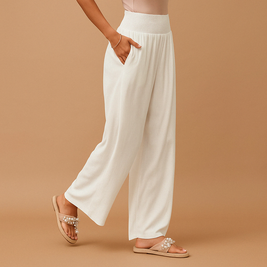 Women’s high-waisted relaxed trousers in white with elastic waistband and wide legs