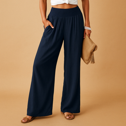 Women’s high-waisted relaxed trousers in navy with elastic waistband and wide legs
