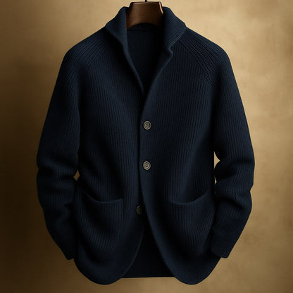 Men's ribbed wool cardigan in dark navy with shawl collar, button front, two front pockets.