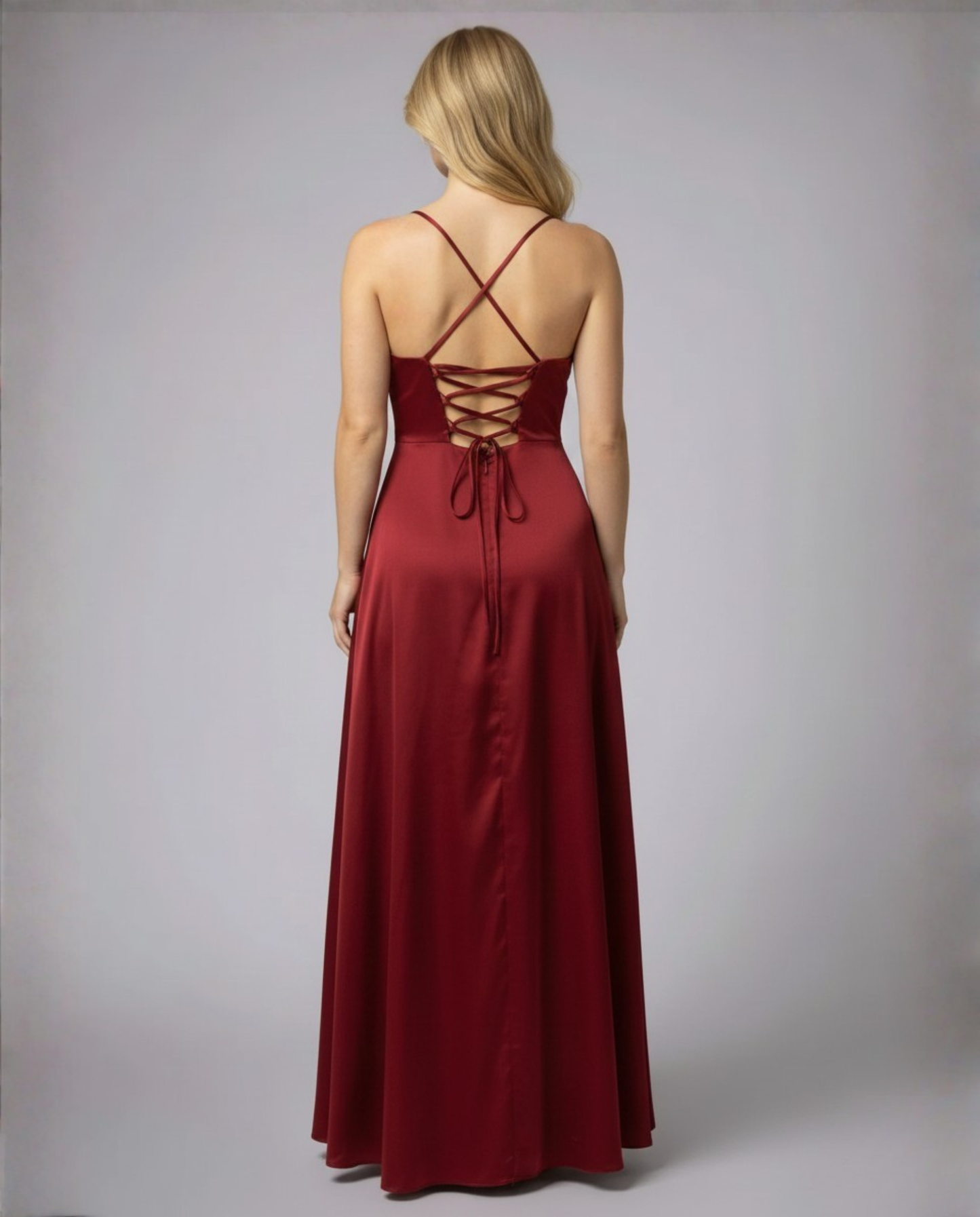 Red satin maxi dress with crisscross open back and split hem