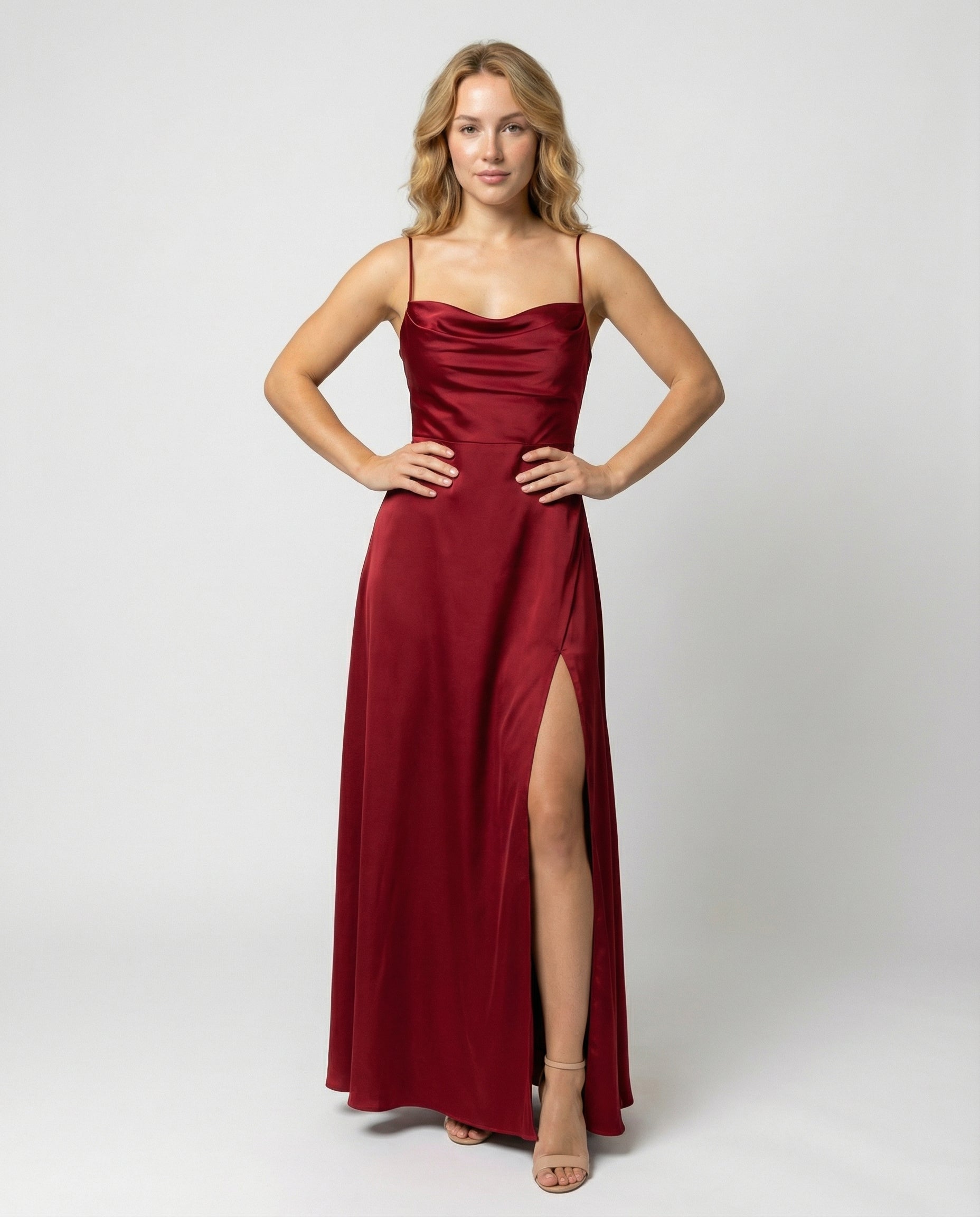 Red satin maxi dress with spaghetti straps and split hem