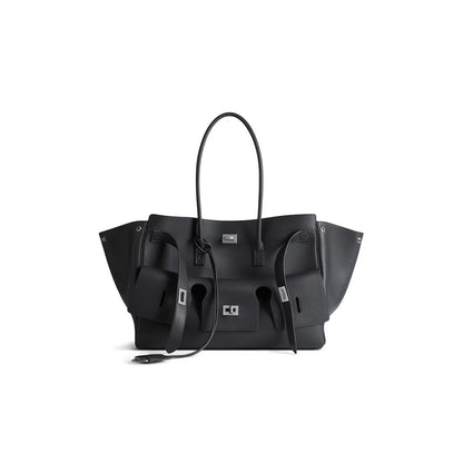 Black structured handbag with top handles and gold-tone hardware, front view
