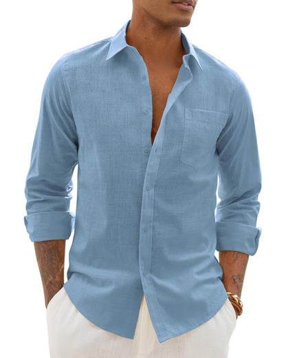Men's long-sleeve button-up shirt in light blue with chest pocket